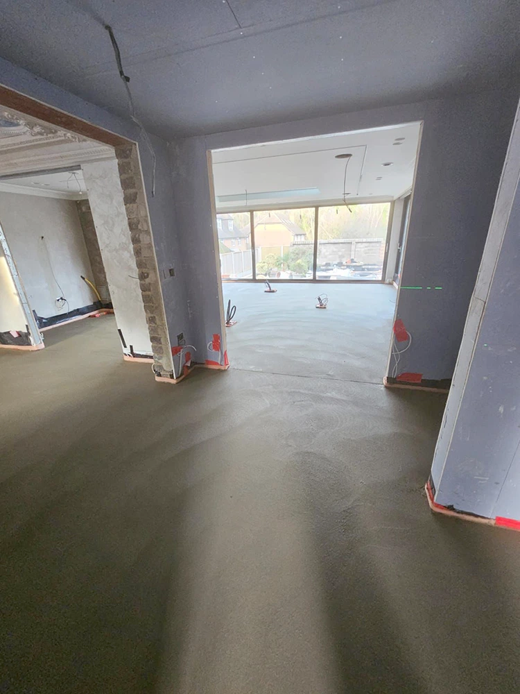 Large open plan room with a finished floor screed