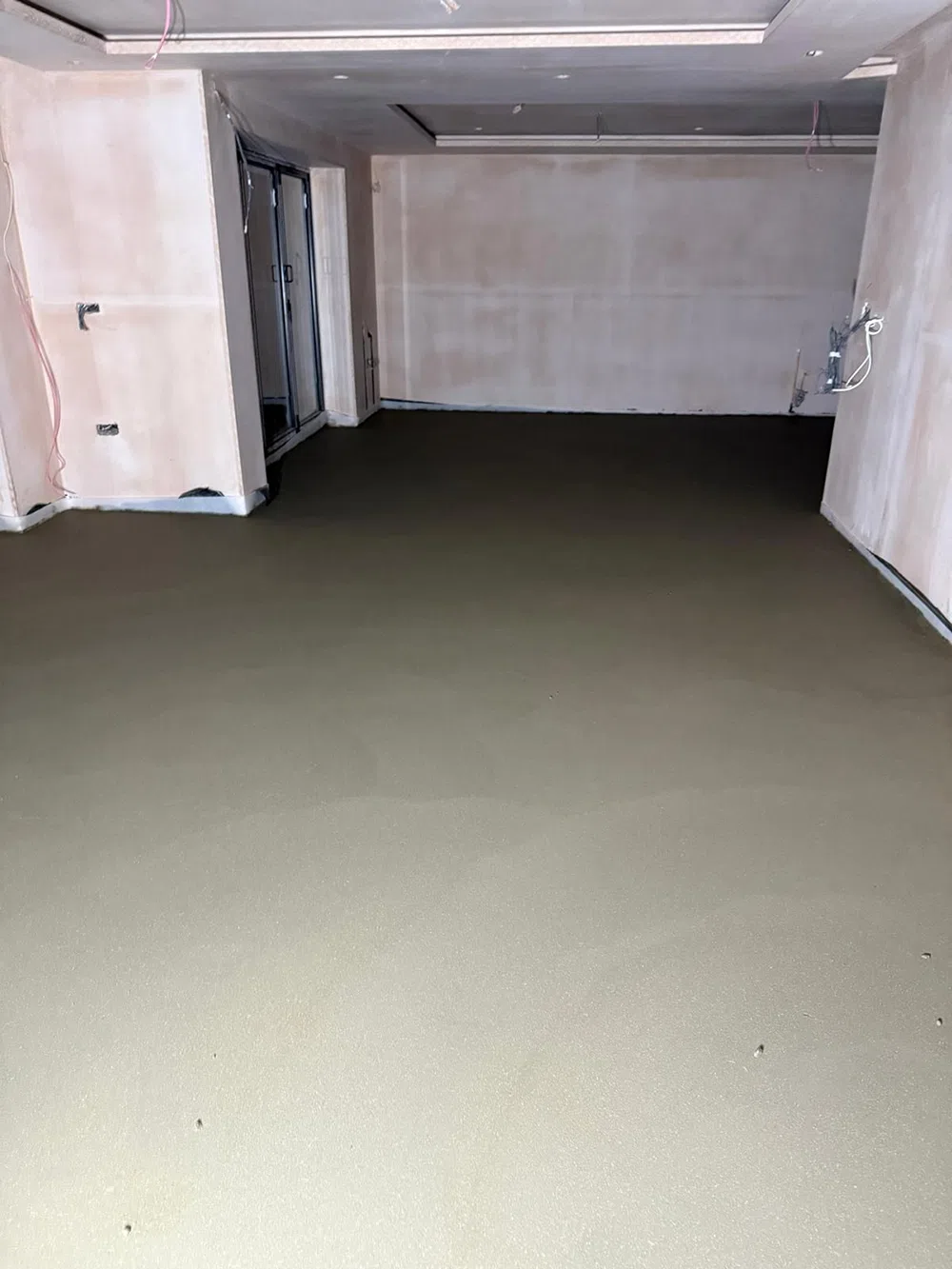 Finished floor screed in a plain walled room