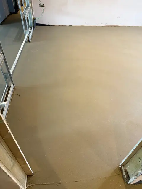 Finished sand and cement floor screed in a domestic room