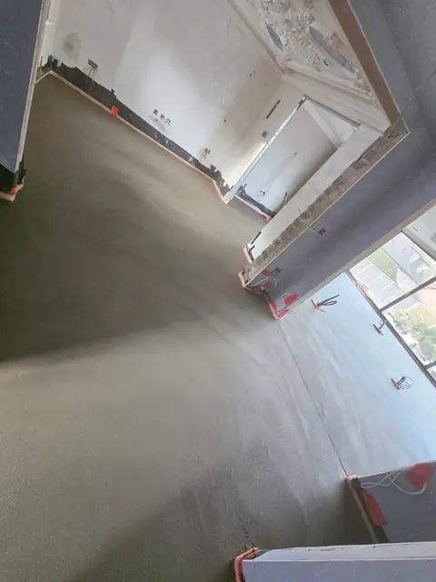 Finished screed floor in a new build room