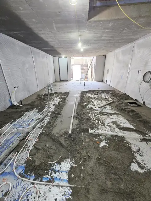 Subfloor stripped back and prepared before new screed