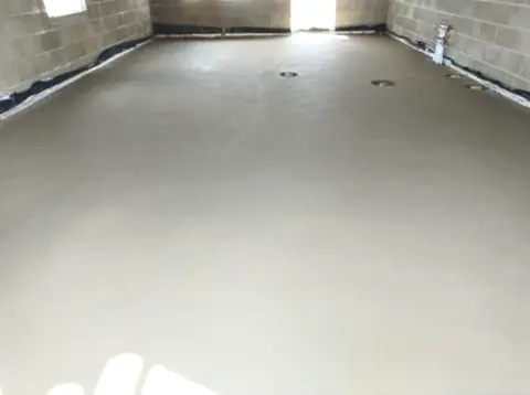 Bright smooth liquid screed across a large room